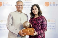 Yunus hands over International Children's Peace Prize to 16 year old environmental activist at the Hague